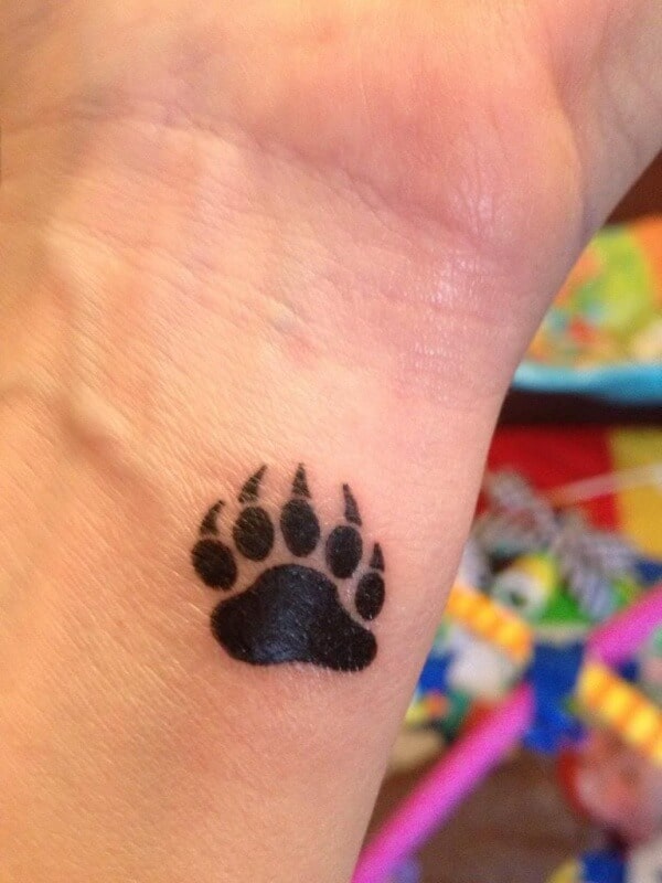 Polar bear tattoo on the wrist