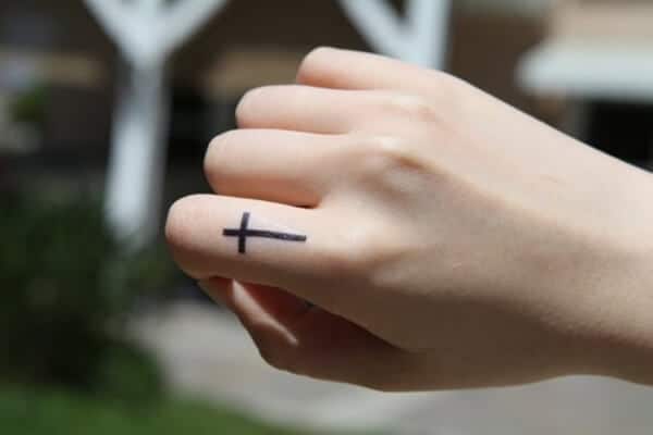 Micro cross tattoo on the inner ankle  Tattoogridnet